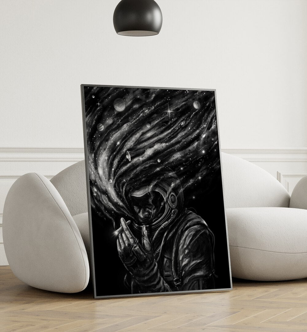 Space Joint By Francis Minoza Astronaut & Nasa Paintings, Space Art Prints Artwork in Black Plain Frame placed near a White Sofa in the Living Room