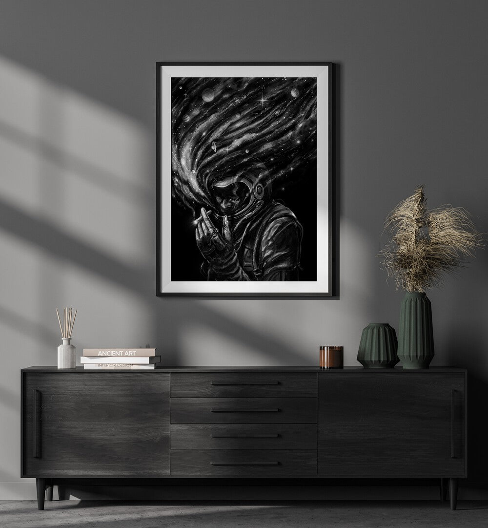 Space Joint By Francis Minoza Astronaut & Nasa Paintings, Space Art Prints Artwork in Black Frame With Mount placed on a Grey Wall in the Living Room