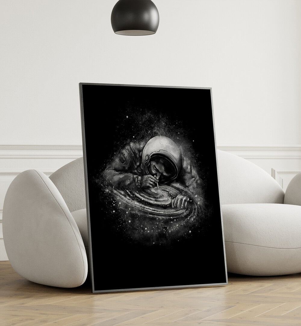 Space Junkie By Francis Minoza Astronaut & Nasa Paintings, Space Art Prints Artwork in Black Plain Frame placed near a White Sofa in the Living Room