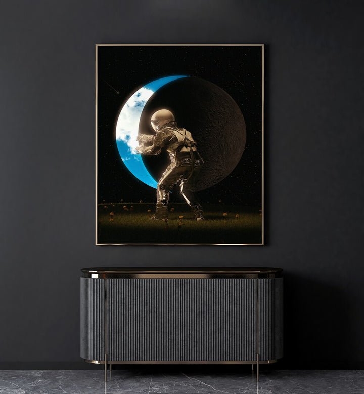 Space Out By Francis Minoza Astronaut & Nasa Paintings, Space Art Prints Artwork in Gold Plain Frame placed above a Console Table near a Dark Grey Colored Wall in the Drawing Room
