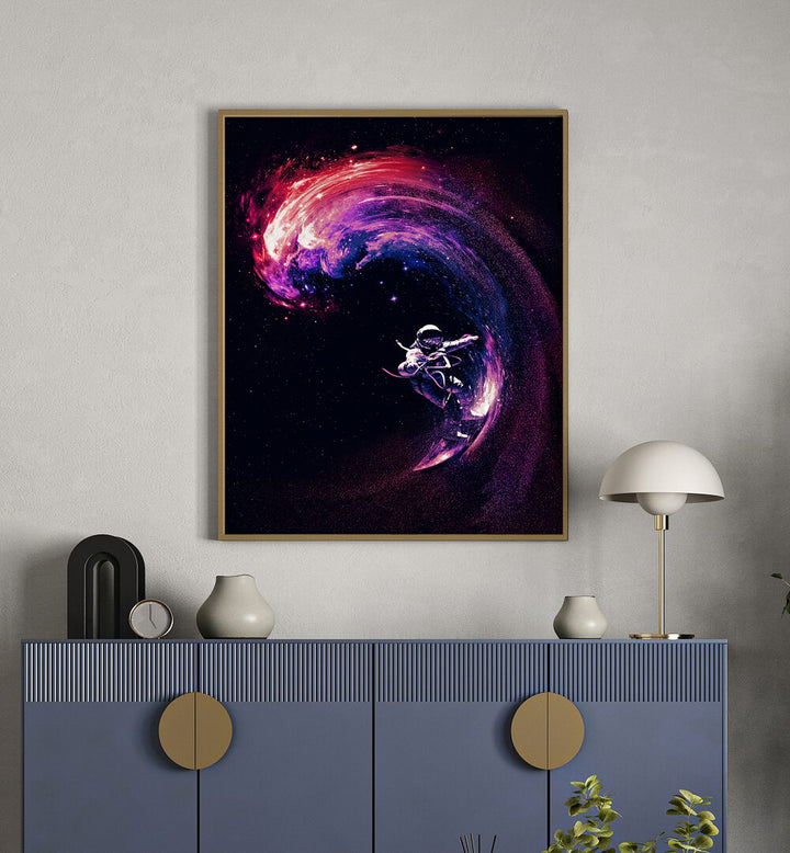 Space Suffering Li By Francis Minoza Astronaut & Nasa Paintings, Space Art Prints Artwork in Oak Wood Plain Frame placed on a Cream Colored Wall above a Console Table in the Drawing Room