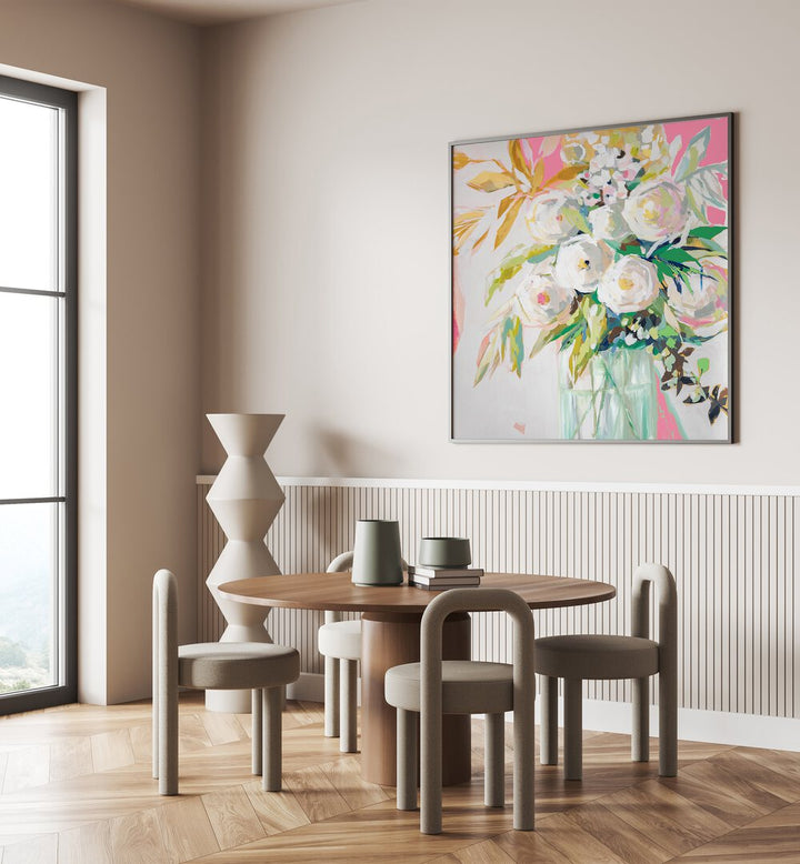 Bright and airy interior featuring SPRINGTIME SOIREE FLORAL, FLORAL FLOWER PAINTINGS above a modern dining table.