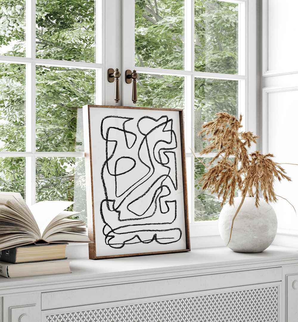 STORY Abstract Paintings elegantly displayed near a window, enhancing modern decor with creativity and emotion.