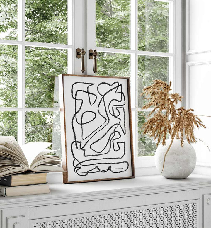 STORY Abstract Paintings elegantly displayed near a window, enhancing modern decor with creativity and emotion.