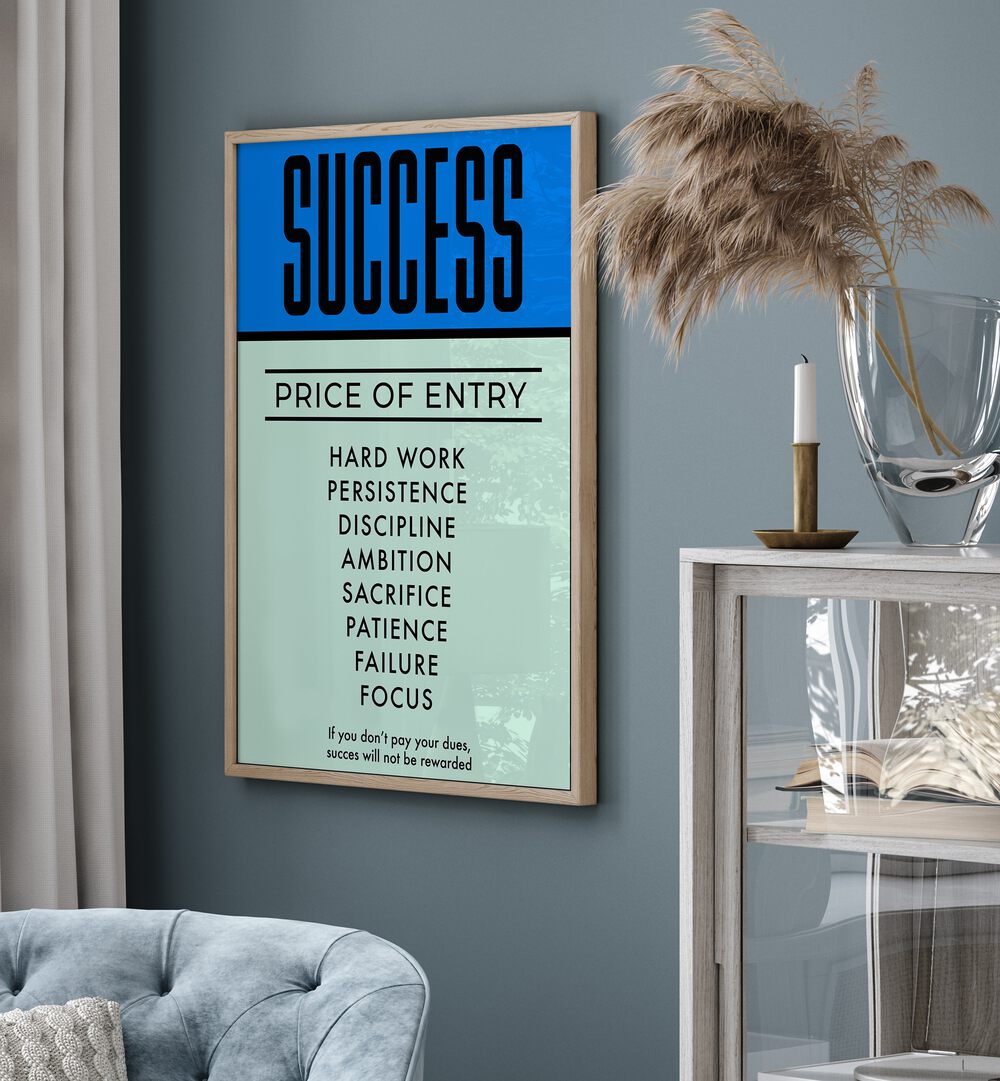 Success Money Art Artwork in oak wood floater frame hainging on wall near grey sofa in living room