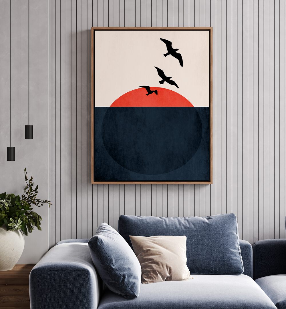 Sunset Breeze Landscape Art Artwork in Oak Wood Floater Frame Placed on a white stripe textured wall behind a blue sofa in the living room