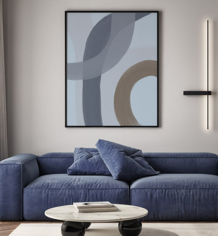 Salon ii by Yopie Studio Abstract Paintings Abstract Art Prints in Black Plain Frame place on a living room wall behind a blue sofa 