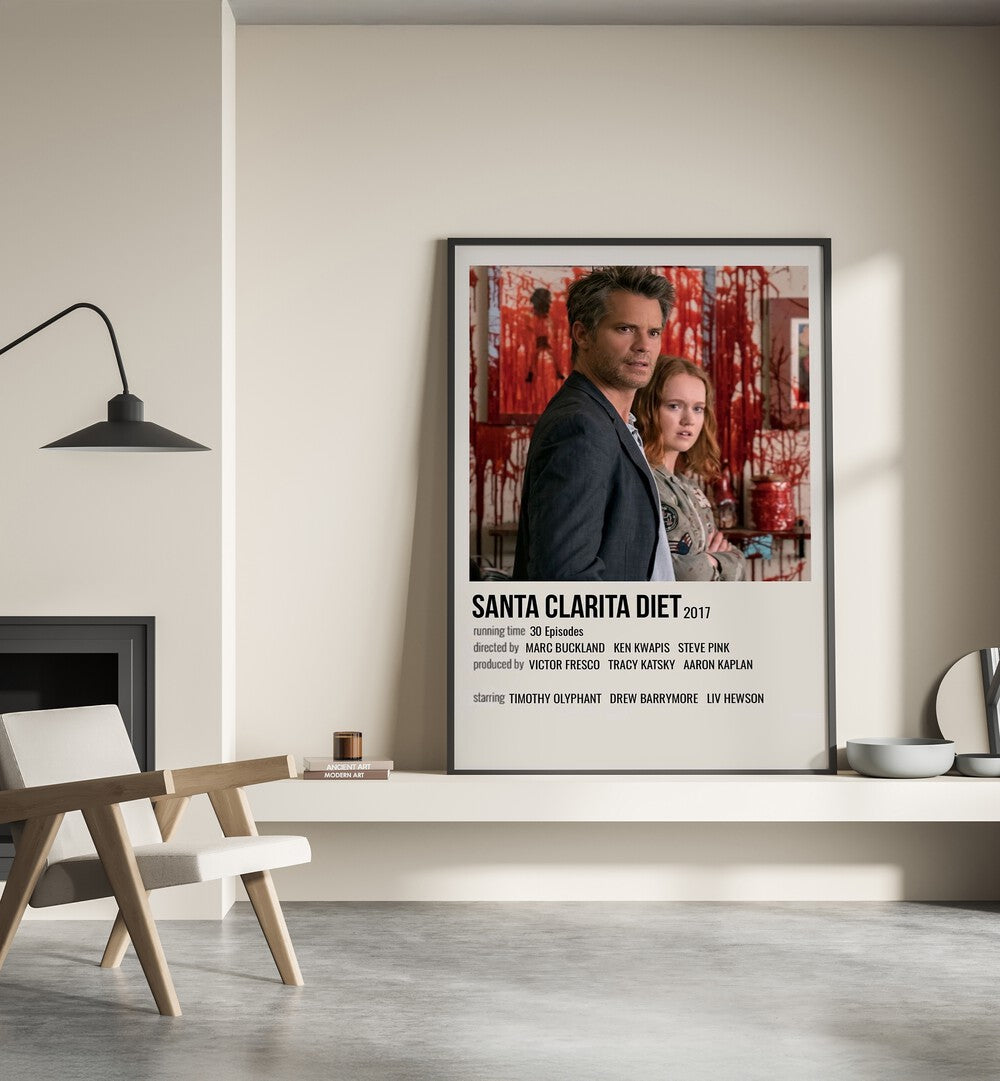 Santa Clarita Diet 2017 Movie Posters in Black Plain Frame place on a wall behind a chair beside lamp