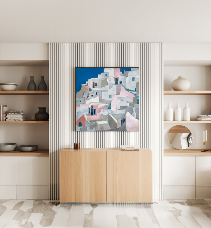 Santorini By Ana Rut Bre Landscape Art Prints in Black Plain Frame placed on a white textured wall above a Console Table in the Living Room