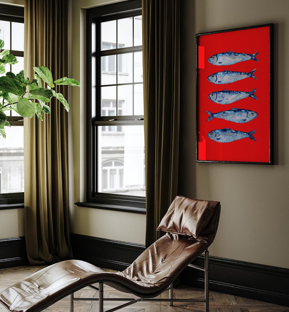 Sardines Berry Red by Alice Straker Kitchen Posters Kitchen Art Prints in Black Plain Frame placed on a living room wall behind a chair and beside a window