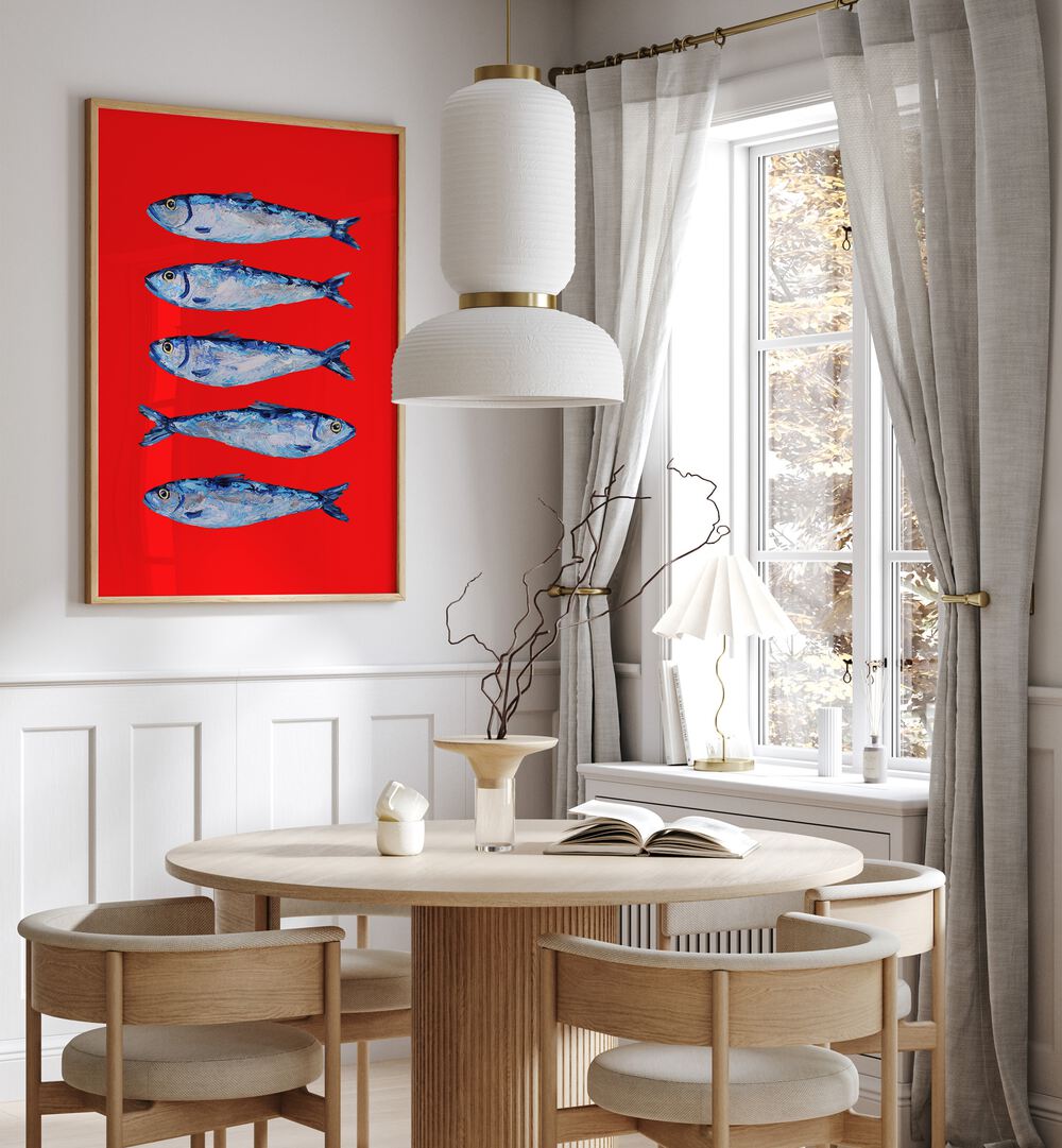 Sardines Berry Red by Alice Straker Kitchen Posters Kitchen Art Prints in Oak Wood Plain Frame placed on a wall in a dining room area beside a window and behind a dining table