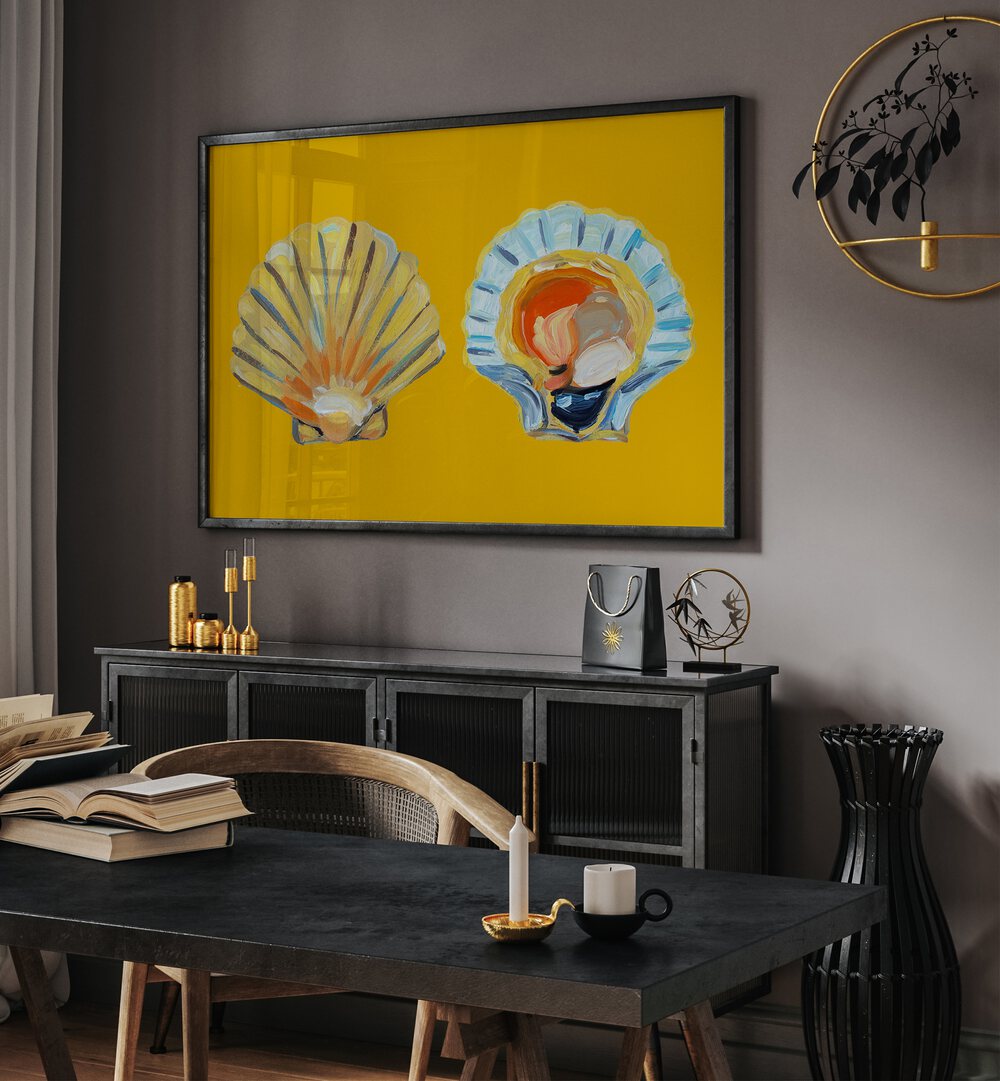 Scallops on Yellow by Alice Straker Cafe Art Prints Cafe Posters in Black Plain Frame placed on a wall behind a black console table