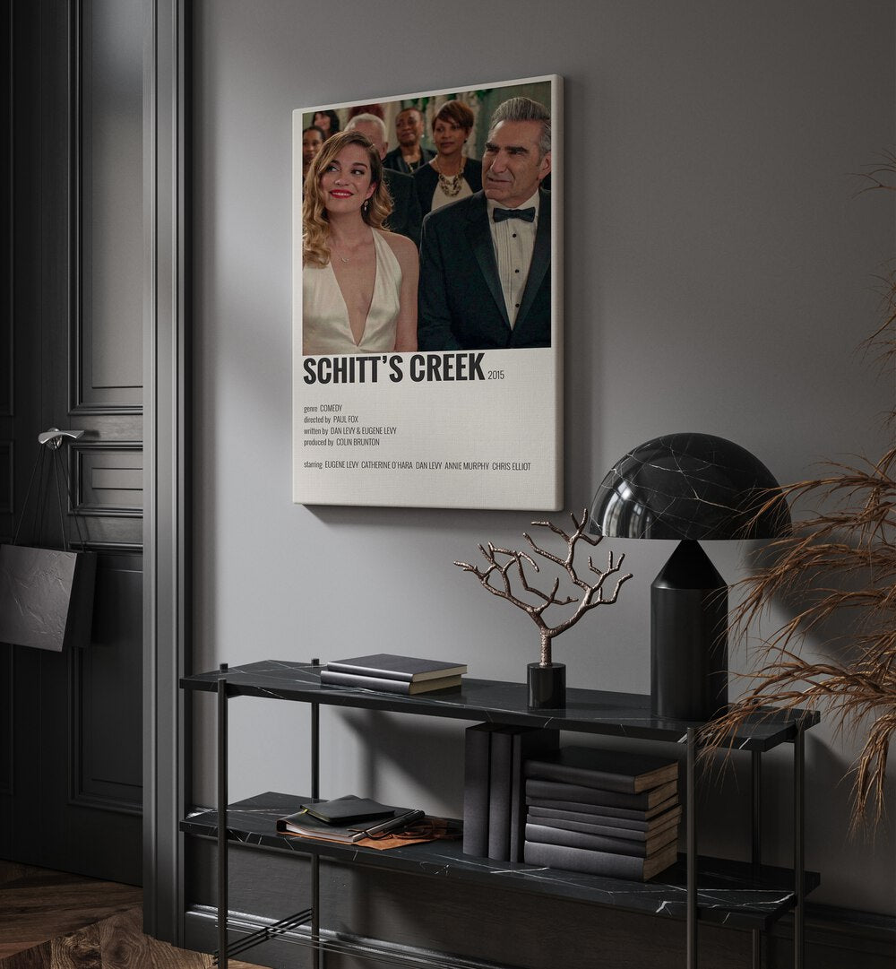 Schitts Creek Movie Posters in Gallery Wrap placed on a wall behind a table and beside a door