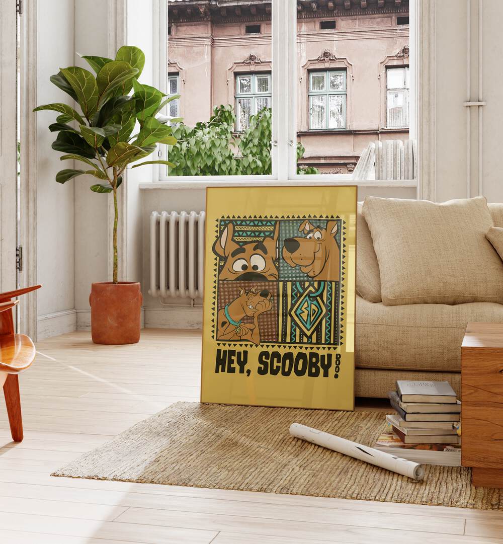 Scooby Doo Comic Wall Art Comic Posters in Oak Wood Plain Frame placed on the floor near a Beige Sofa in the Living Room