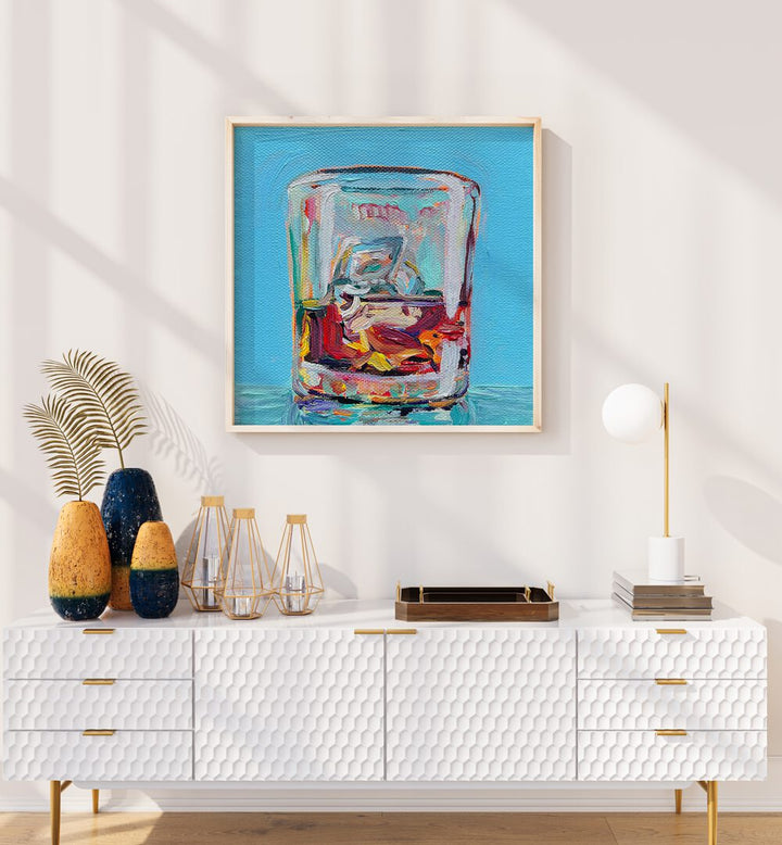 Scotch By Key And Sea Creative Bar and Cafe Art Print in Oak Wood Plain Frame on a white wall above a console table