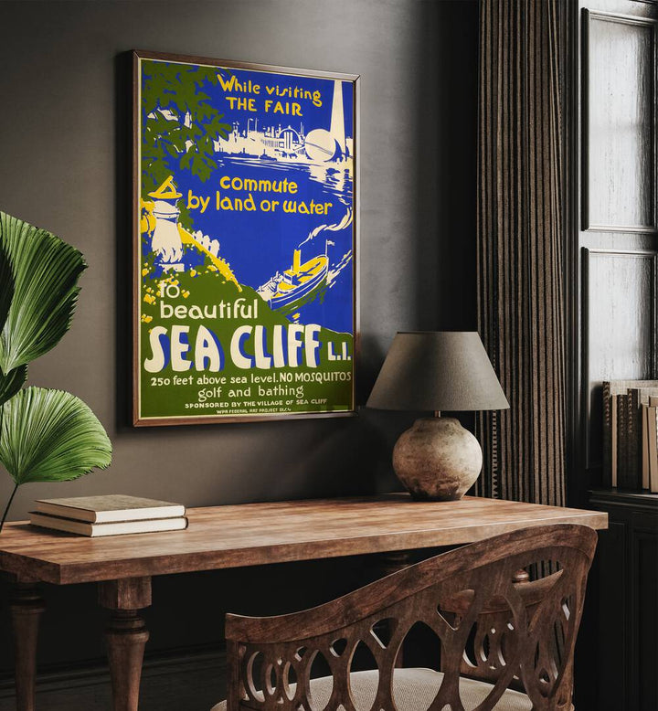 Sea Cliff II  Vintage Travel Posters in Oak Wood Plain Frame placed on a wall behind a study table