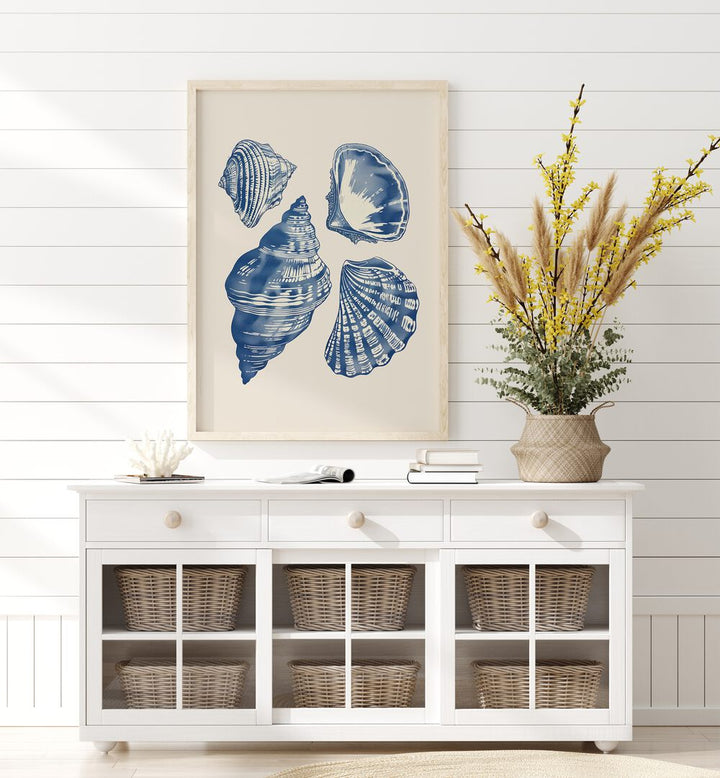 Seashore Jewels I Beach Prints Coastal Wall Art in Oak Wood Plain Frame placed above a Console Table 