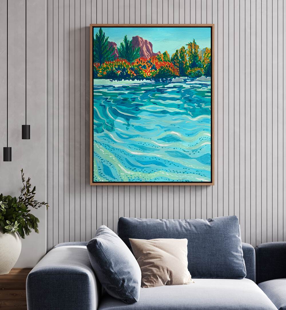 Sedona By Key And Sea Creative Landscape Art Print in Oak Wood Floater Frame behind a sofa on a white wall