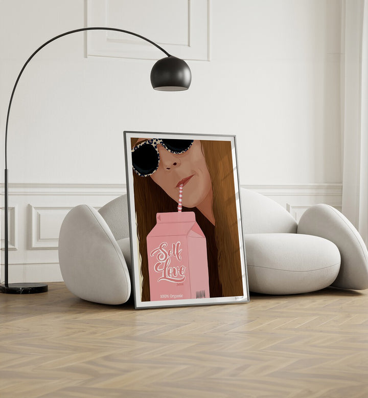 Self Love Portraits And Figurative Illustrations in Black Plain Frame placed on the floor near a White Sofa in the Living Room