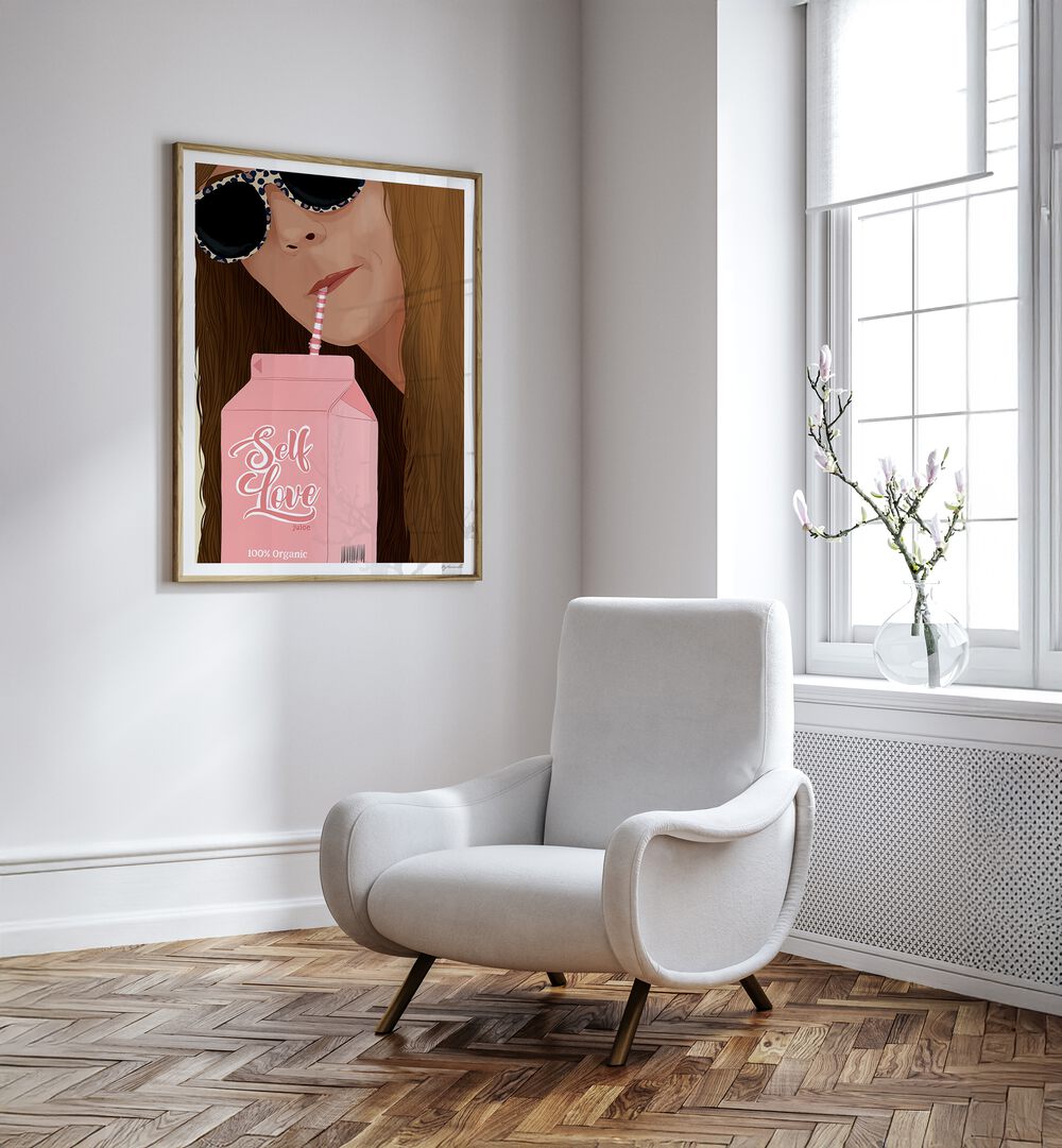 Self Love Portraits And Figurative Illustrations in Oak Wood Plain Frame placed on a White Colored Wall near a White Sofa Chair in the Drawing Room