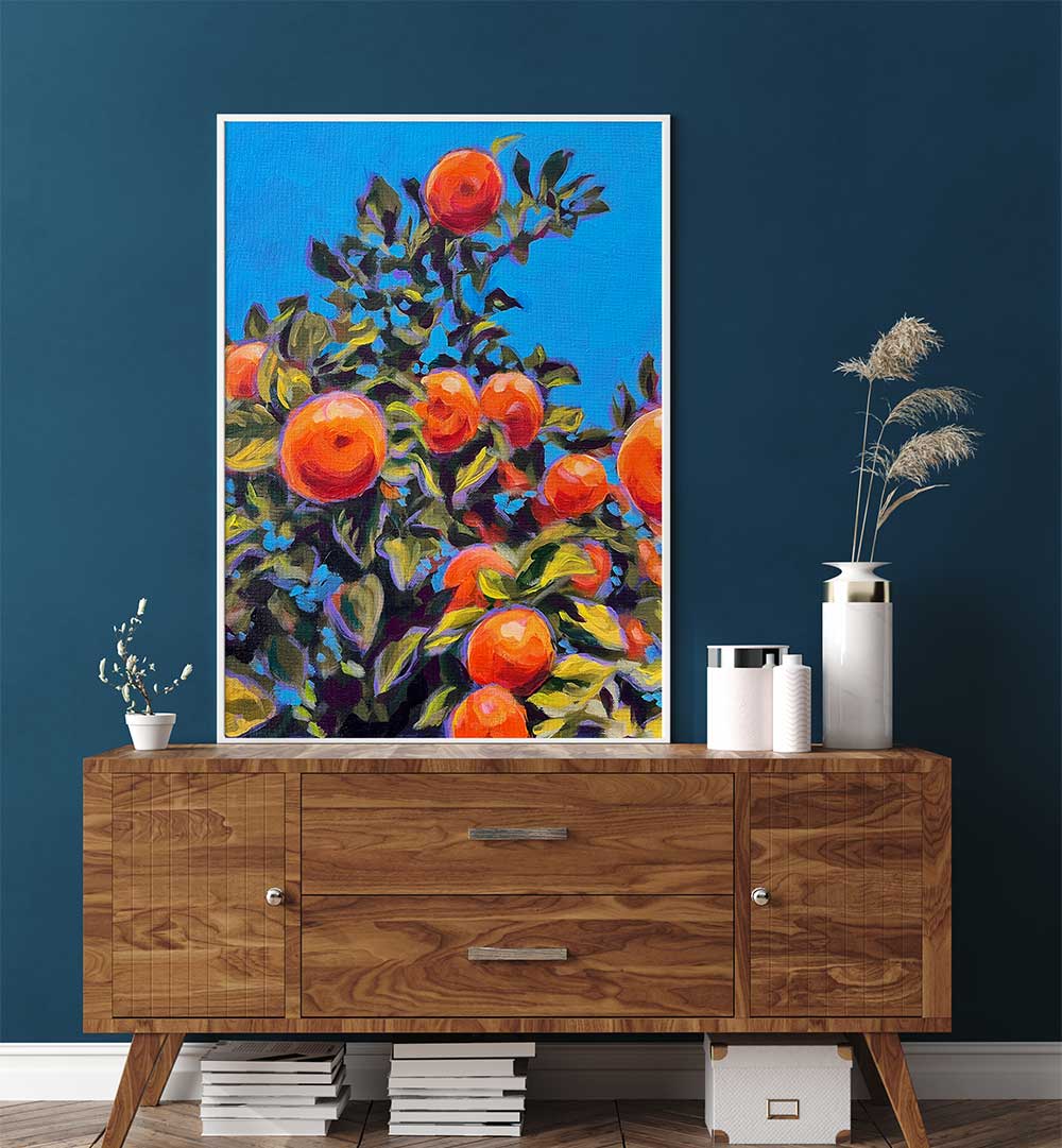 Framed SEVILLE ORANGES , KITCHEN POSTERS with vivid citrus painting above a wooden mid-century sideboard