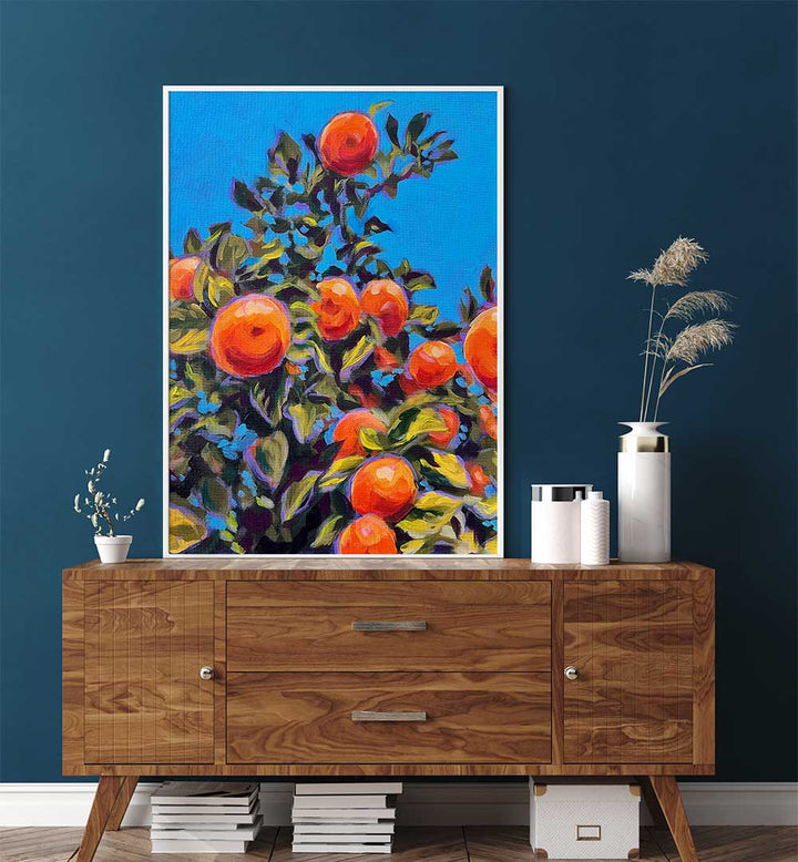 Framed SEVILLE ORANGES , KITCHEN POSTERS with vivid citrus painting above a wooden mid-century sideboard
