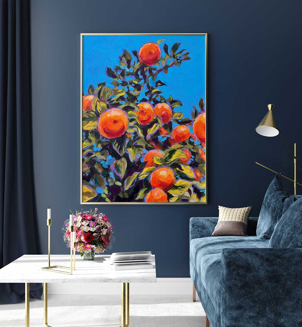 Framed SEVILLE ORANGES , KITCHEN POSTERS: vibrant citrus branches on blue canvas above navy sofa in modern living room