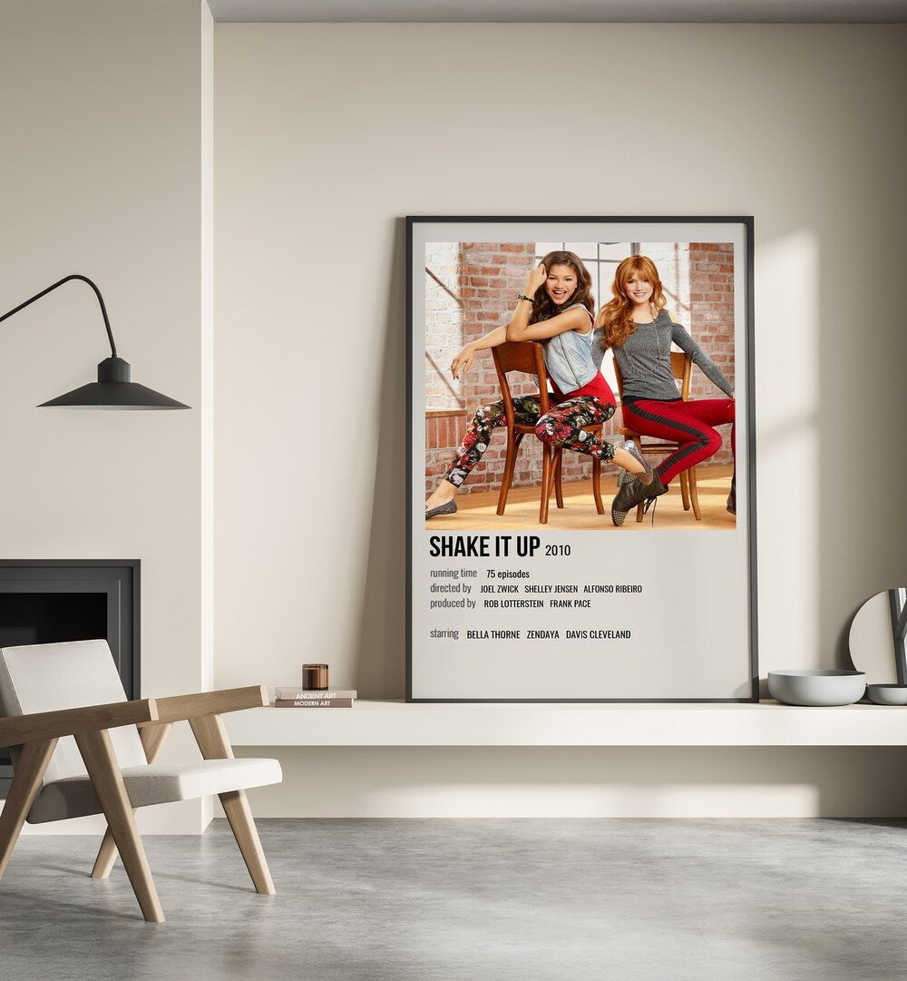 Shake It Up 2010 Movie Posters in Black Plain Frame place on a wall behind a chair beside lamp