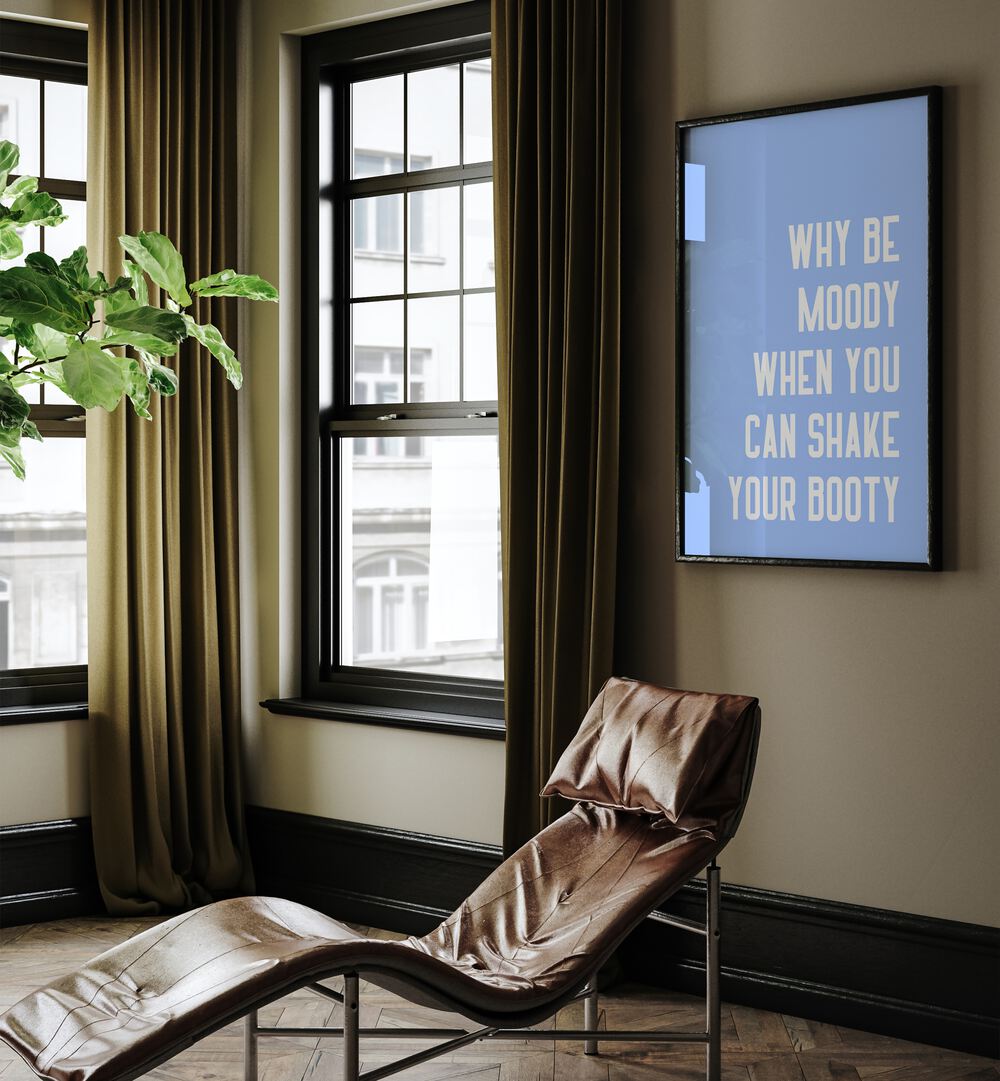 Shake Thy Booty by Athene Fritsch Quotes and Typography Posters in Black Plain Frame placed on a living room wall behind a chair and beside a window