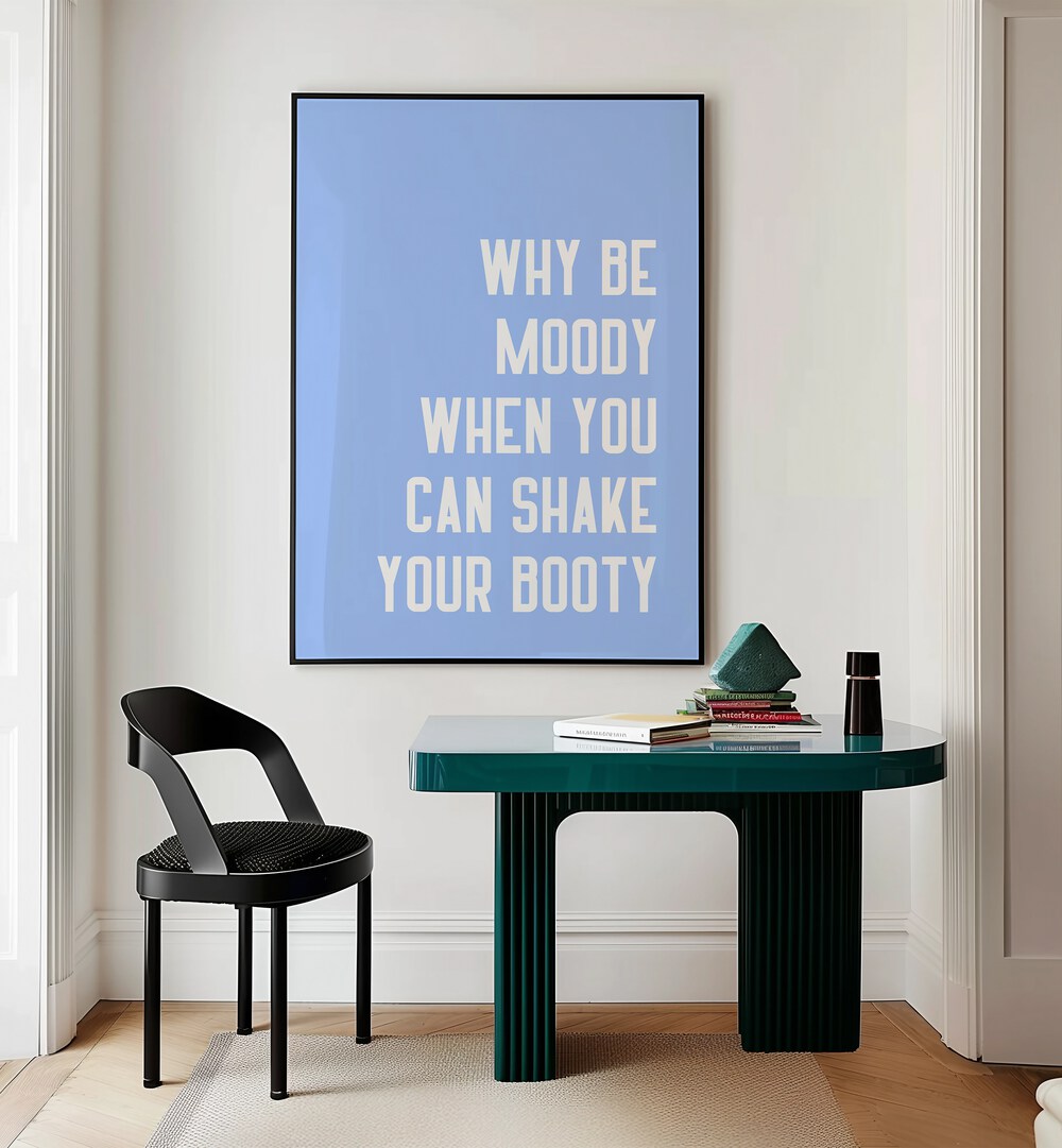 Shake Thy Booty by Athene Fritsch Quotes and Typography Posters in Black Plain Frame placed on a wall behind a study table