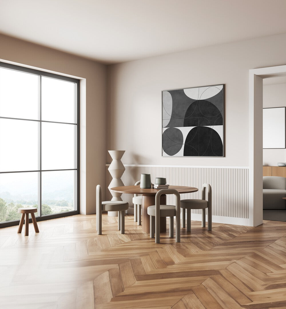 Shapes BW I By Ana Rut Bre Abstract Art Abstract Paintings in Black Plain Frame placed on a Cream Colored Wall near a Dining Table in the Dining Room