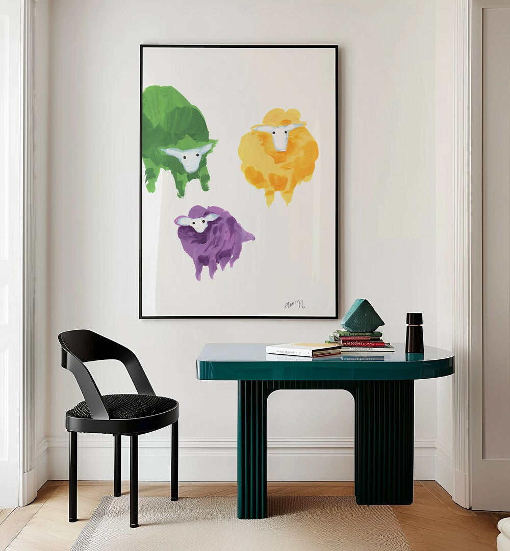 Sheep Triplets By Ania Zwara Kids Room Paintings Kids Room Wallart in Black Plain Frame placed on a Cream Colored Wall near a Table in a Workspace in the Drawing Room