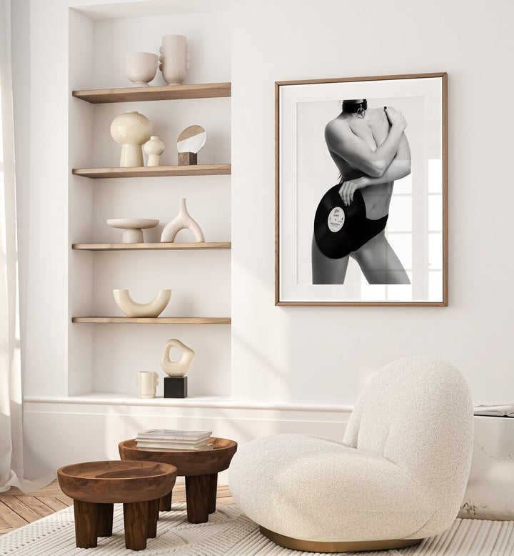 Sin Rock Me by David Drake Fine Art Photography Fashion Photography in Oak Wood Frame With Mount placed on a wall beside a sofa