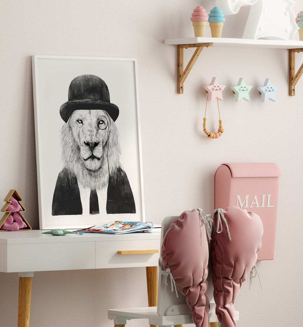 Sir Lion By Balazs Solti Wildlife Art Prints in White Plain Frame placed on a Study Table in the Kids Room