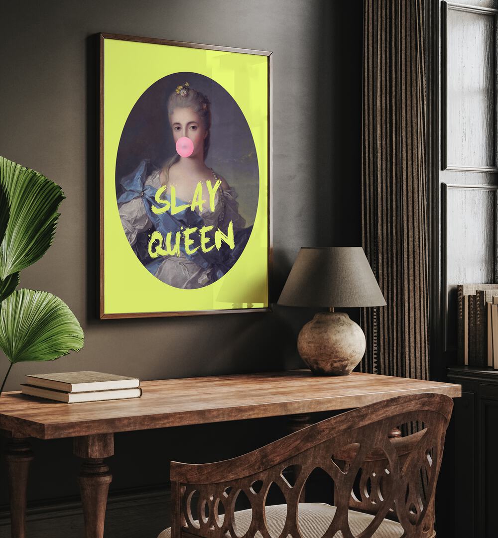 Slay Queen By Grace Digital Art Co Altered Art Prints in Dark Wood Plain Frame placed on a wall behind a study table