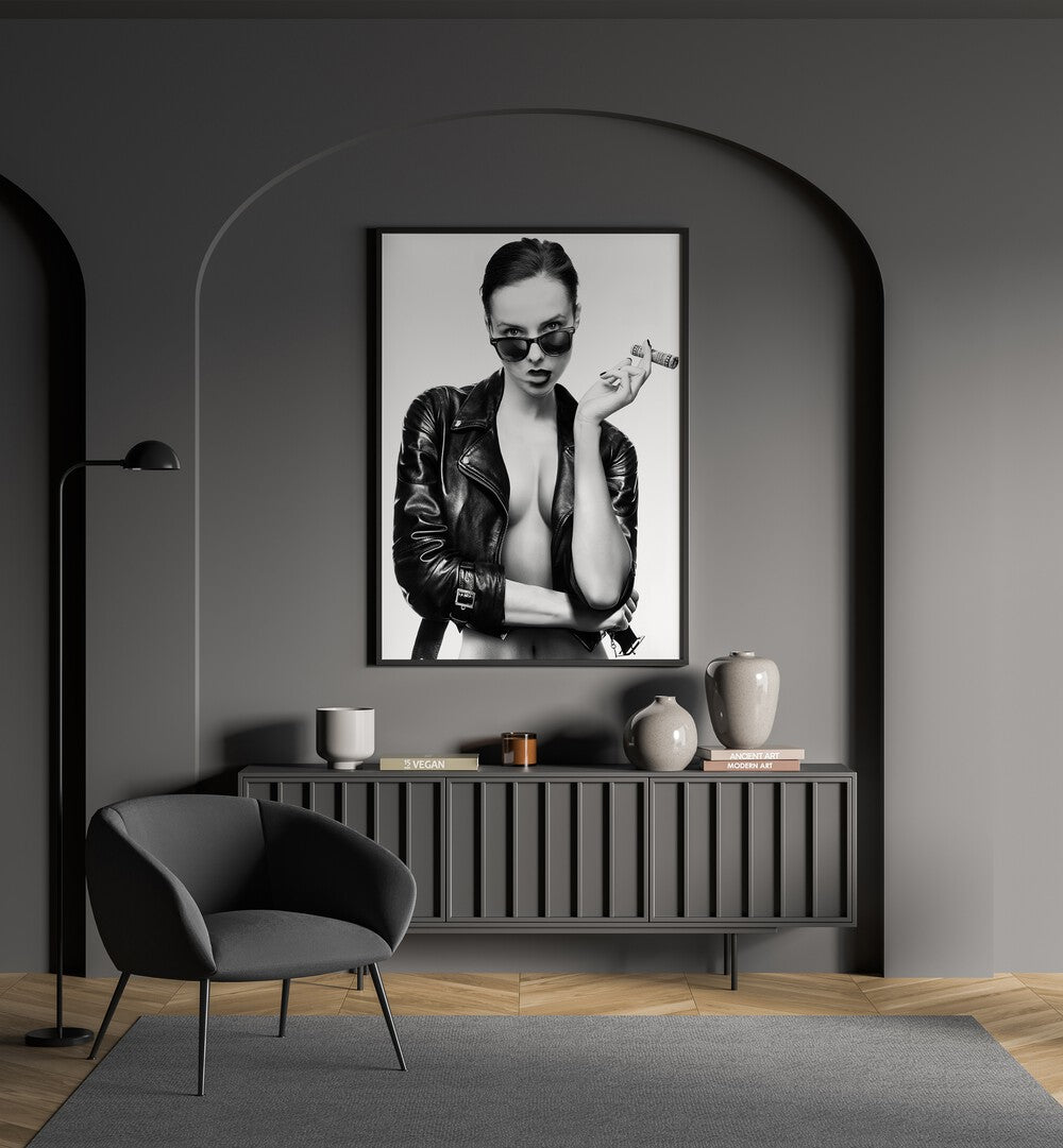 Smoke This ii by David Drake Fine Art Photography Fashion Photography in Black Plain Frame placed on a wall behind a console table