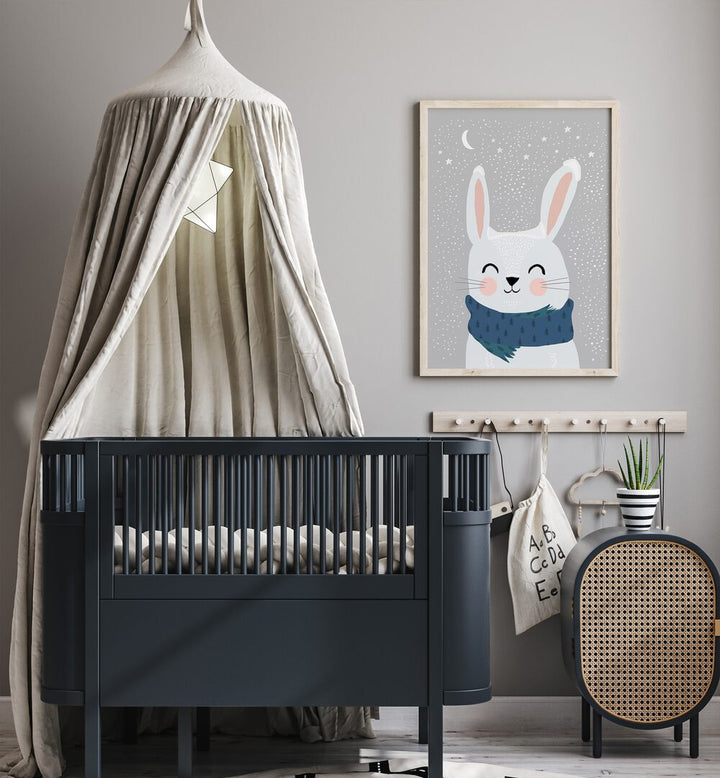 Snow Bunny By Treechild Kids Paintings in Oak Wood Plain Frame placed on a Grey Colored Wall in the Kids Room