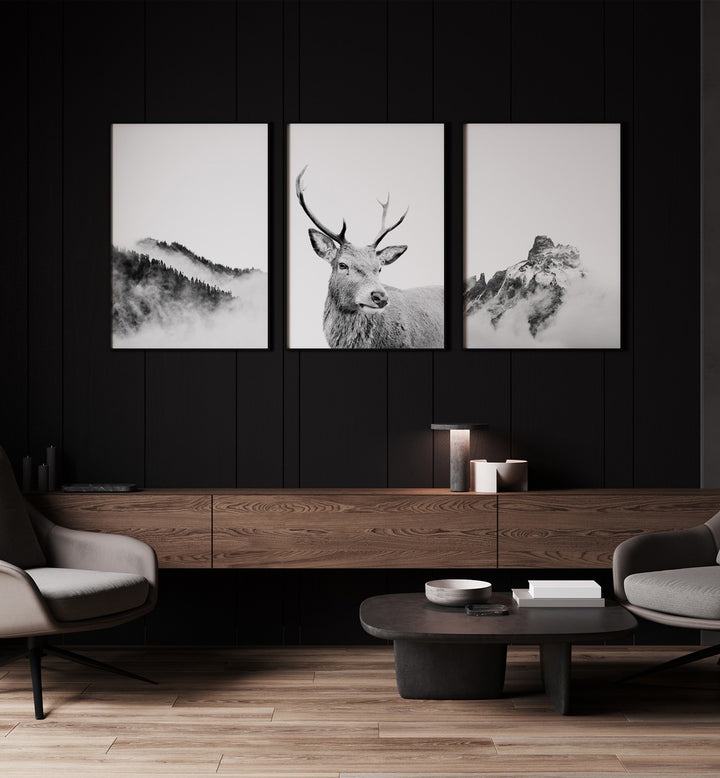 Snow Forest Set Of 3 Paintings in Black Plain Frame placed on a wall behind a console table