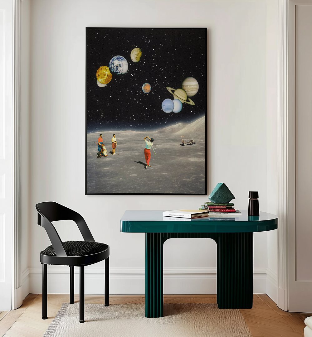 Space Golf Surreal Paintings Surreal Art Prints in Black Plain Frame placed on a White Colored Wall Above a Study Table near a Workspace in the Drawing Room