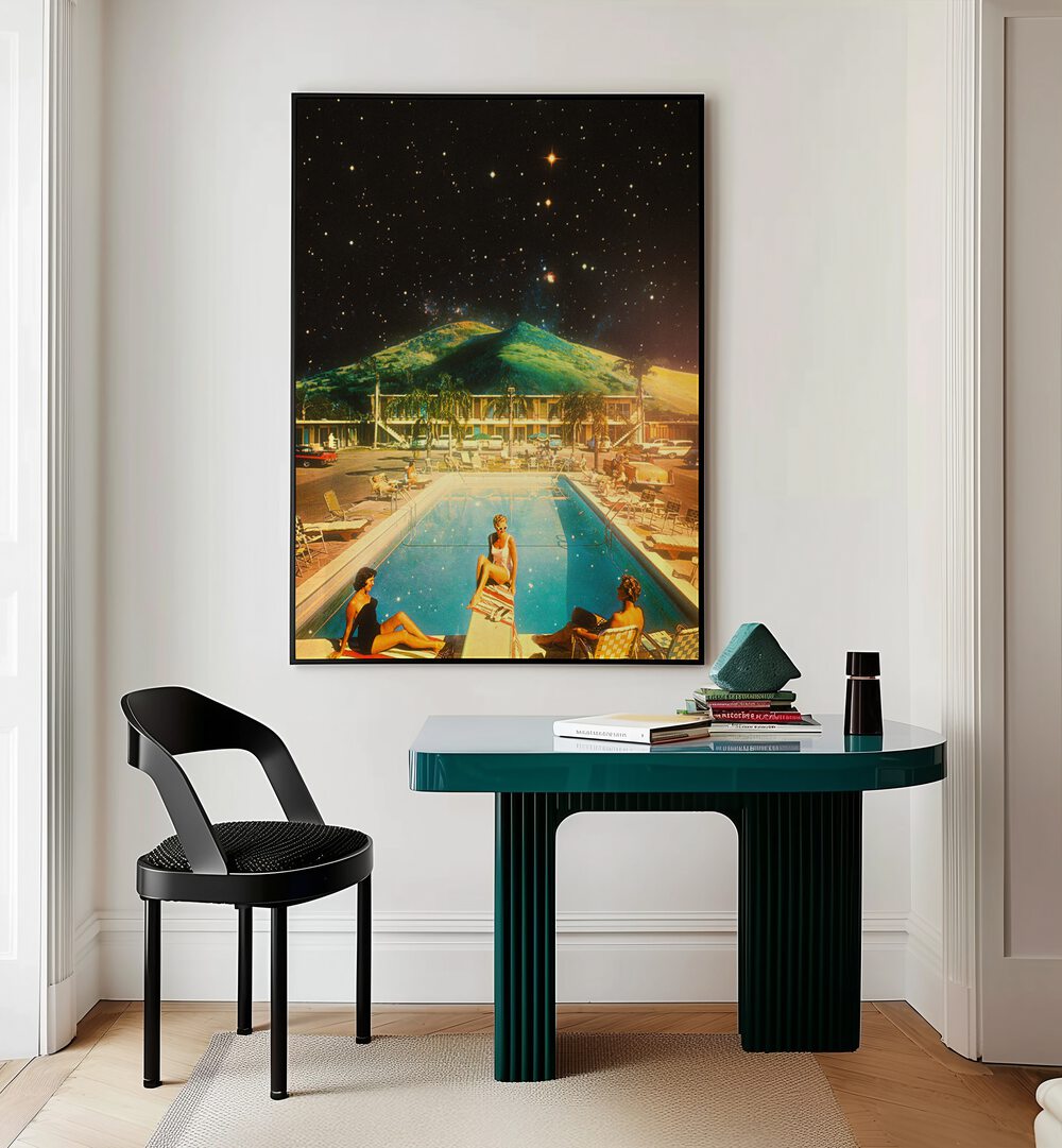 Space Pool Surreal Paintings Surreal Art Prints in Black Plain Frame placed on a White Colored Wall Above a Study Table near a Workspace in the Drawing Room