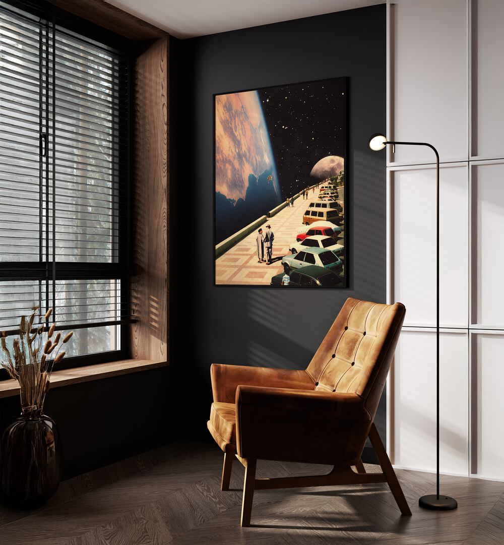 Space Promenade Surreal Paintings Surreal Art Prints in Black Plain Frame placed on a Dark Grey Colored Wall near a Brown Sofa Chair in the Drawing Room