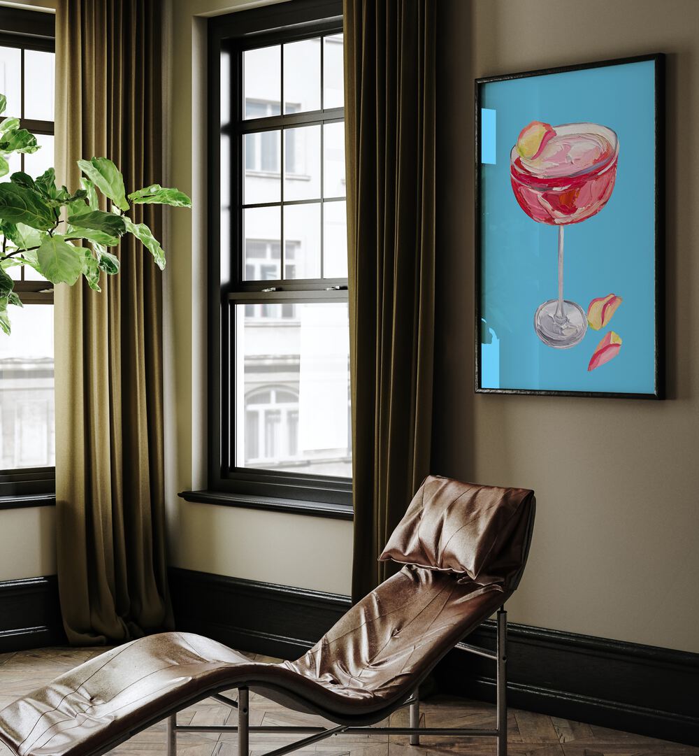 Sparkling Rose Gin Cocktail by Alice Straker Bar Posters Bar Art Prints in Black Plain Frame placed on a wall in living room behind a chair and beside a window