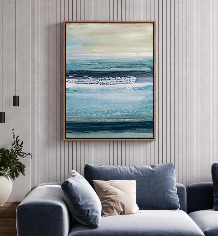 Splashed By Dan Hobday Abstract Art Abstract Paintings in Oak Wood Floater Frame placed on a White Colored Wall near a Blue Sofa in the Living Room