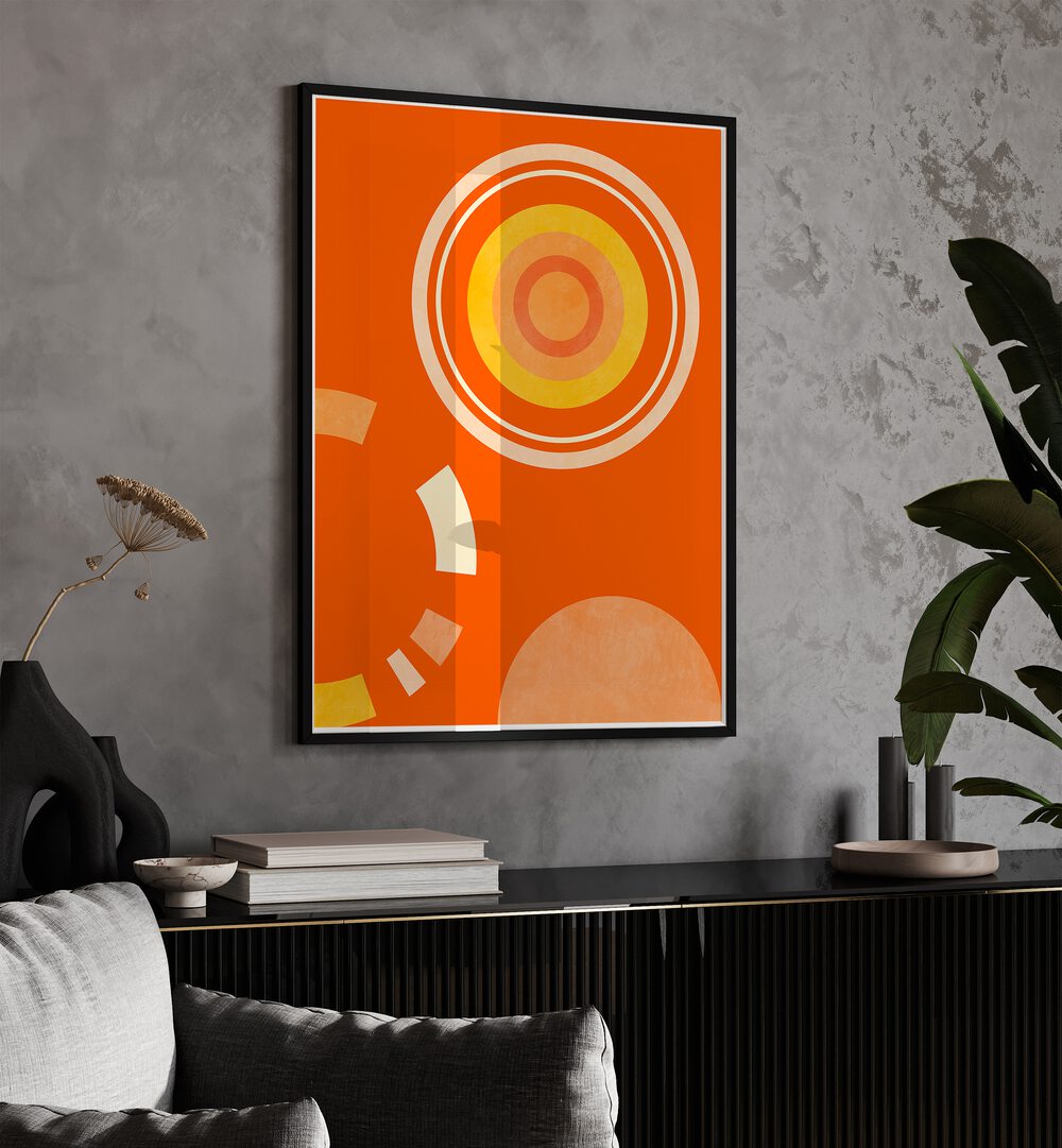 Spring Mid Raphsody Orange IV By Ana Rut Bre Abstract Art Abstract Wall Art in Black Plain Frame placed on a wall behind a table