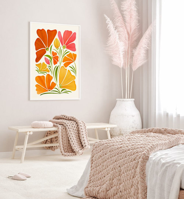 Spring Wildflowers by Kristian Gallagher Botanical Flower Paintings Floral Paintings in White Plain Frame placed on a wall in a bedroom behind a table