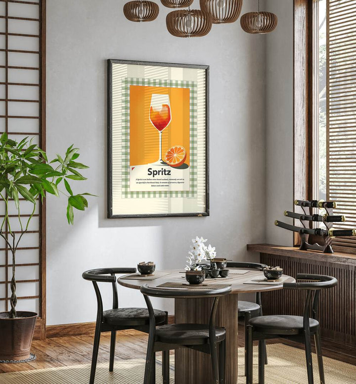 Spritz Retro Print by Studio Mandariini Kitchen Posters Kitchen Art Prints in Black Plain Frame placed on a wall in a dining room area beside a window and behind a dining table