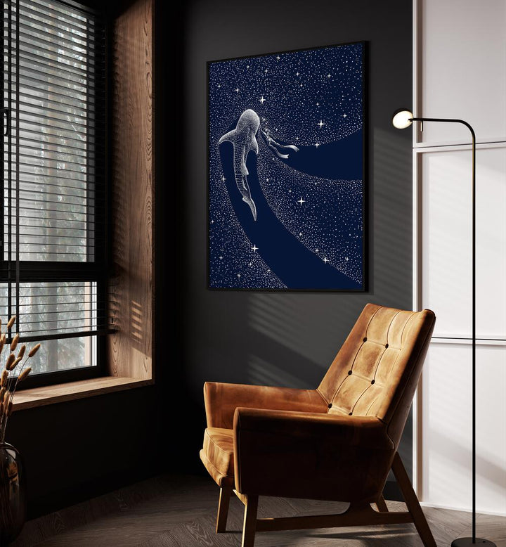 Star Eater And Diver II By Aliriza Cakir Surreal Paintings Surreal Art in Black Plain Frame placed on a Dark Grey Colored Wall near a Brown Sofa Chair in the Drawing Room