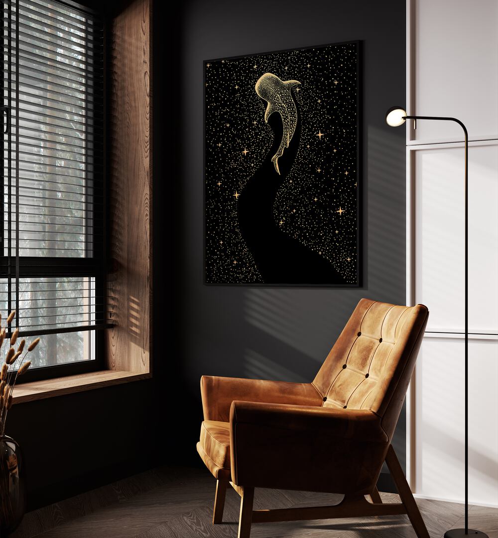 Star Eater Dark Gold Version By Aliriza Cakir Surreal Paintings Surreal Art in Black Plain Frame placed on a Dark Grey Colored Wall near a Brown Sofa Chair in the Drawing Room