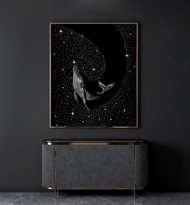 Starry Whale Black Version By Aliriza Çakir Surreal Paintings Surreal Art in Gold Plain Frame placed on a Dark Grey Colored Wall above a Console Table in the Living Room