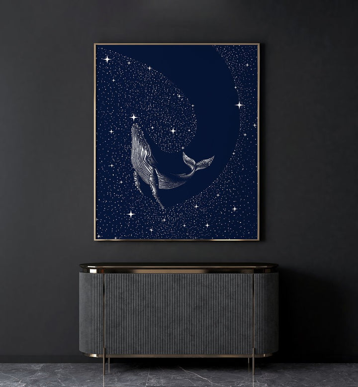 Starry Whale By Aliriza Çakir Surreal Paintings Surreal Art in Gold Plain Frame placed on a Dark Grey Colored Wall above a Console Table in the Living Room